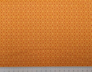 Oranje ondergrond met kleine hexagonen erop